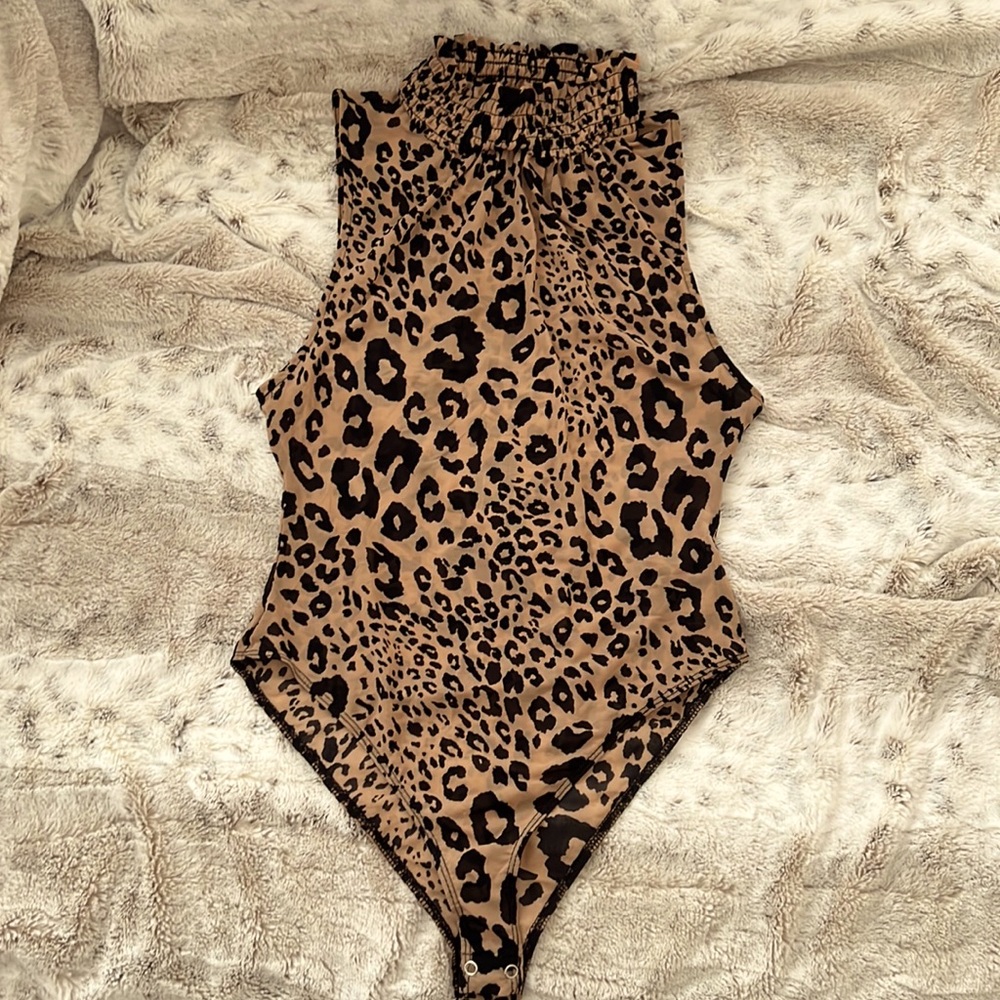 Forever 21 Leopard Print Sheer
Sleeveless Bodysuit - Large